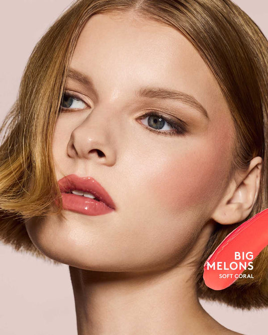 light skin toned model wearing cheeks out freestyle cream blush in shade big melons