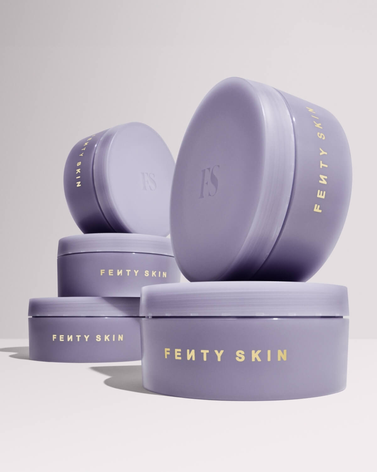 Five closed tubs of Butta Drop Whipped Oil Body Cream with Tropical Oils + Shea Butter.
