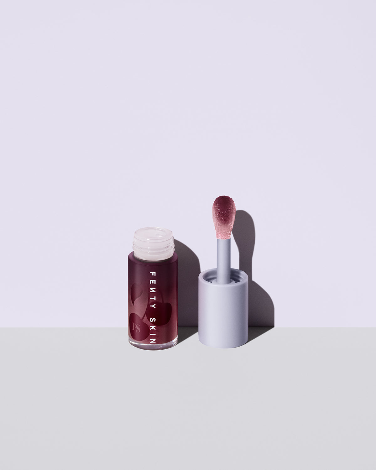 fenty treatz black cherry on lavender background