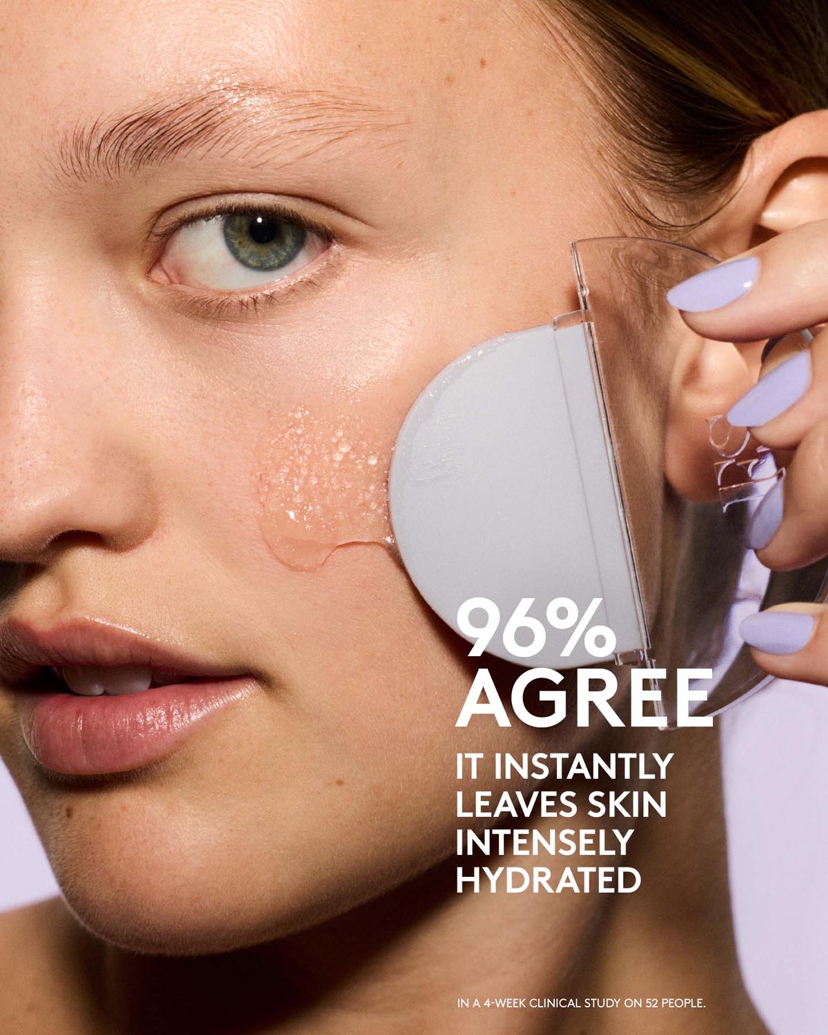 Woman applying a skincare product to her face with text about hydration levels.