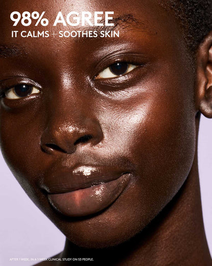 Close-up of a person's face with text indicating skin calming and soothing effects.