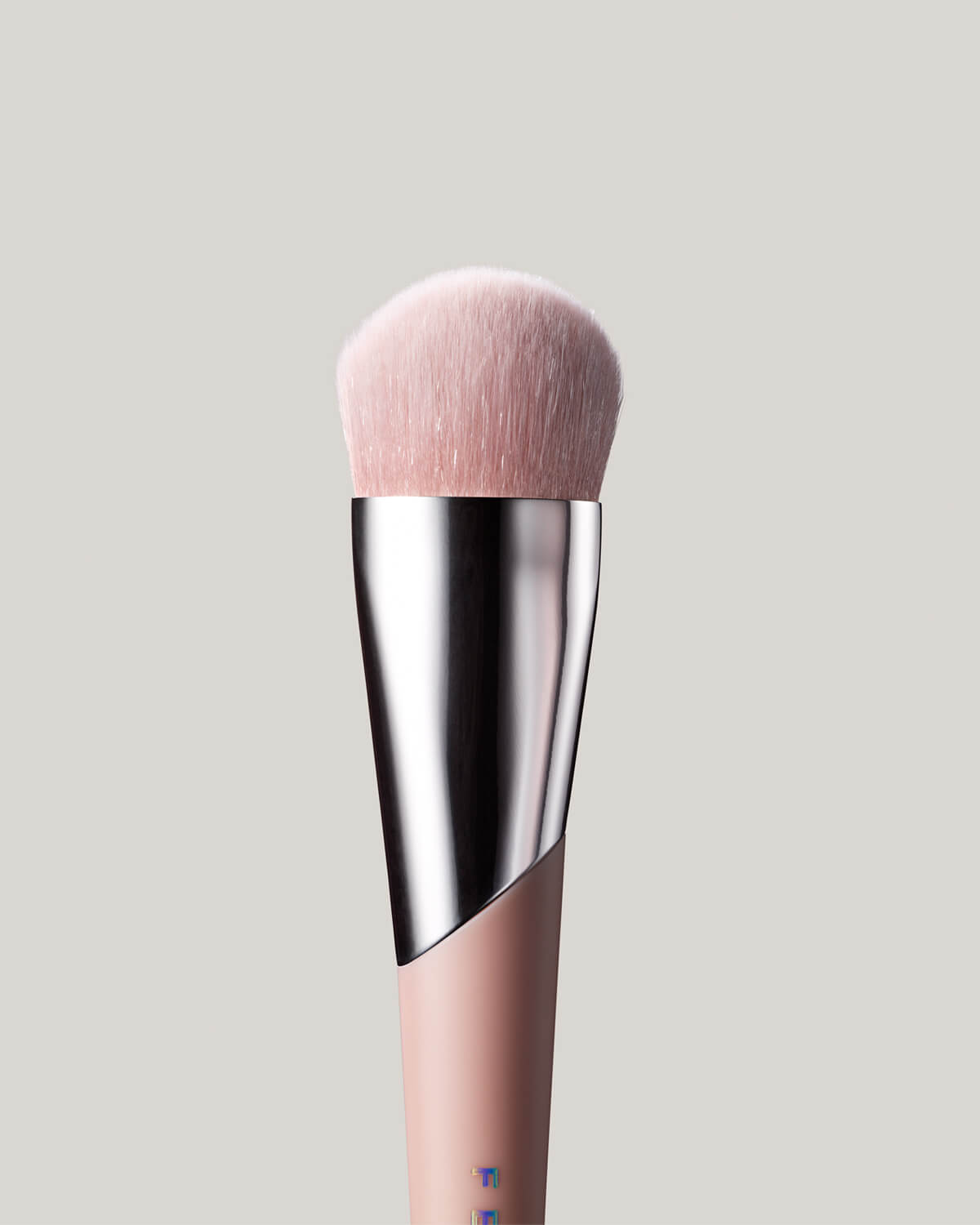 Close-up shot of the Full-Bodied Foundation Brush 110, showcasing its bristles and design in detail.