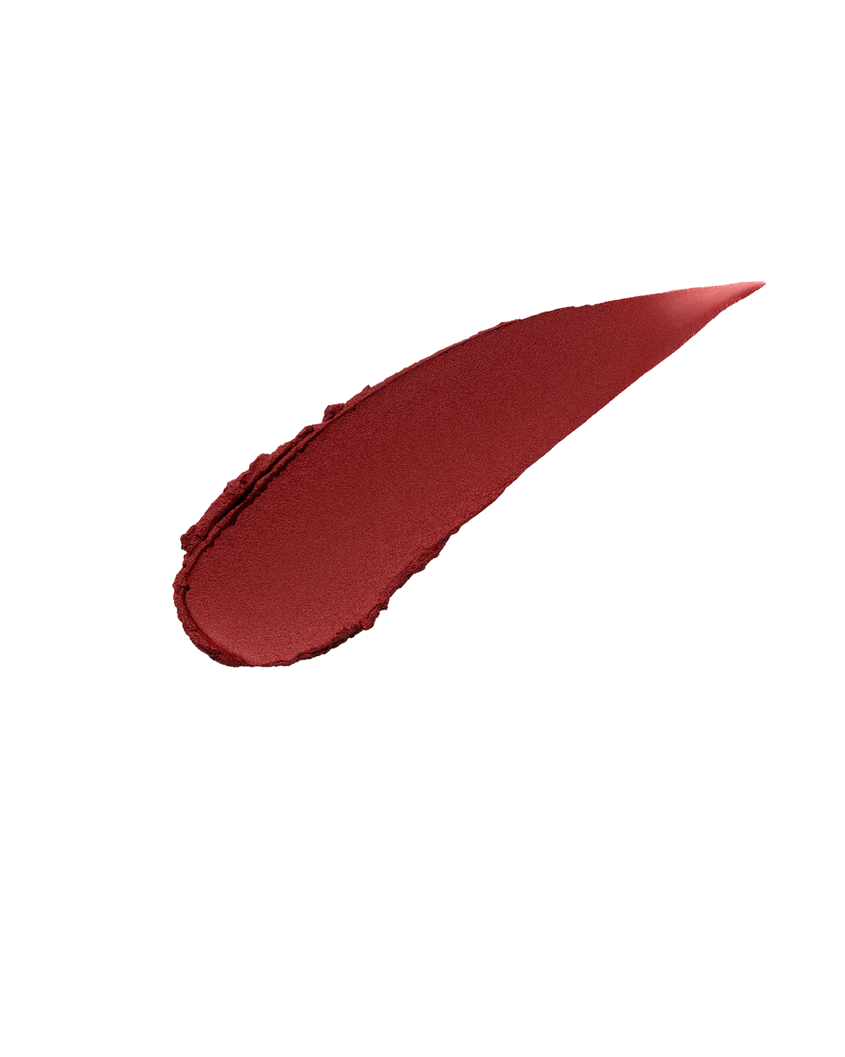 A smear of Fenty Icon Velvet lipstick in brick red color on a light background.