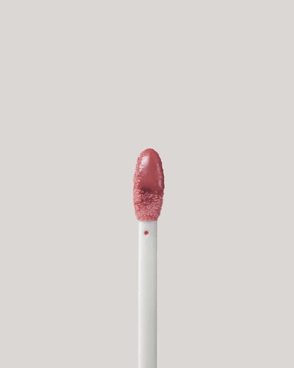 Close Up of Pro Kiss'r Luscious Lip Balm in shade Pinch Me applicator.