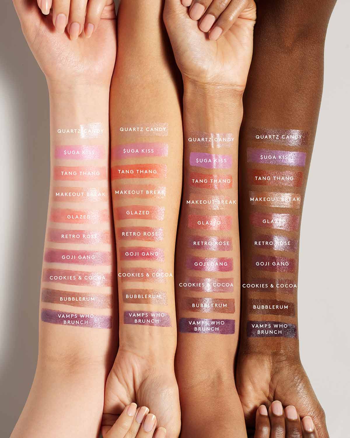 All shades of Slip Shine Sheer Shiny Lipstick shown on a variety of skin tones arms