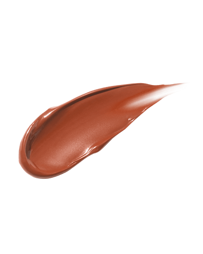 smear of Fenty Beauty Gloss Bomb Cream Color Drip Lip Cream lip gloss shown in shade Cookie Jar