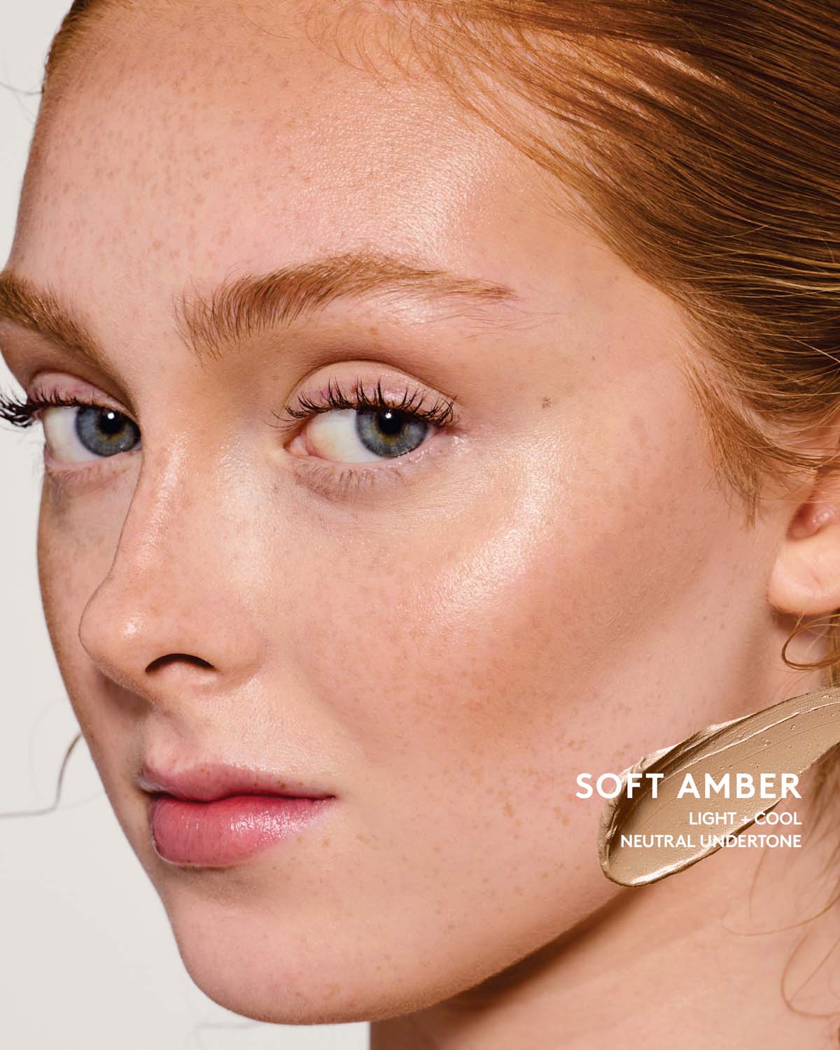 Light Skin tone model wearing match stix contour in soft amber