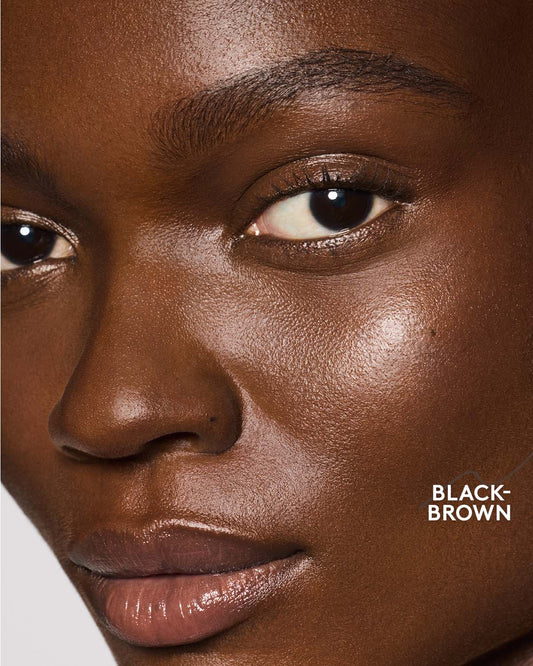 deep skin toned model wearing brow MVP in black-brown