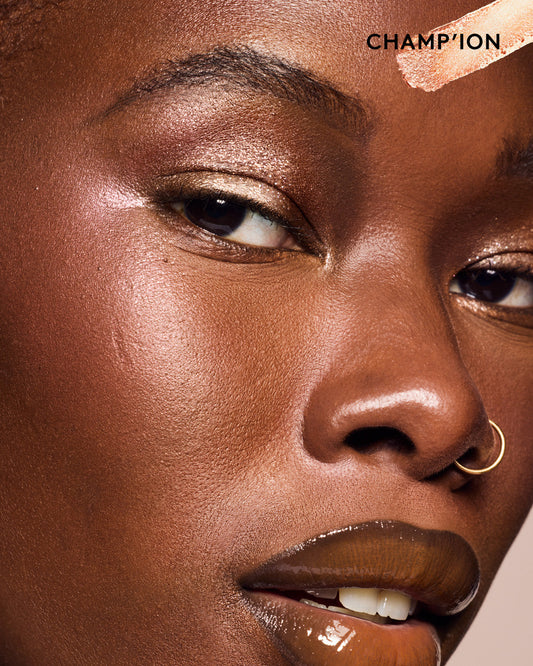 Model wearing Shadowstix Diamonds Diamond Veil Eyeshadow Sticks in shade Champion.