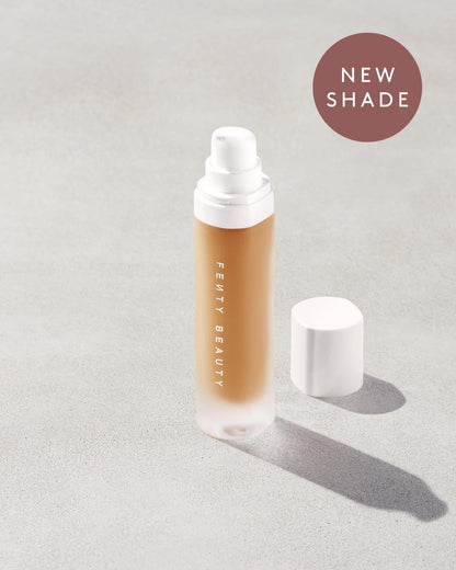 An open bottle of a new shade of Pro Filt'r Soft Matte Longwear Foundation in the shade 335 on a grey background.