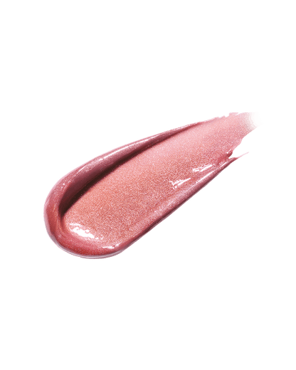 A smear of Gloss Bomb Universal Lip Luminizer in the shade Candy Soda on a white background.