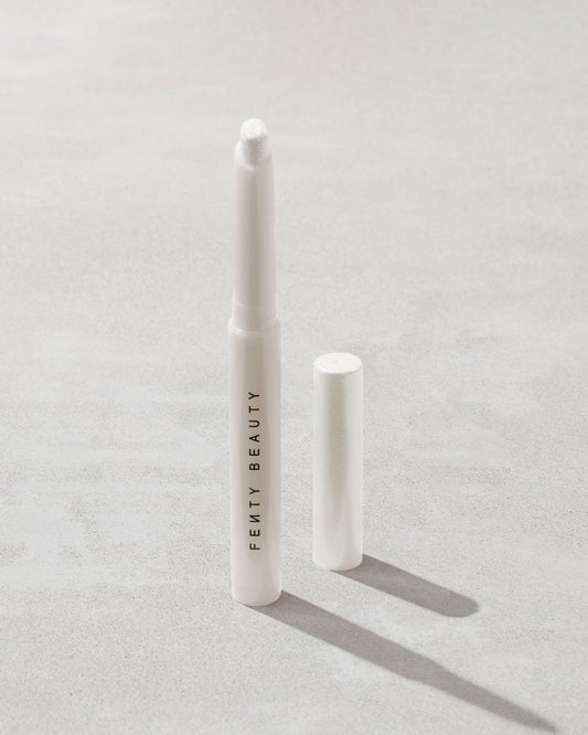 Open shot of Shadowstix Diamonds Diamond Veil Eyeshadow Stick in shade How Many Carats?! on a concrete background.