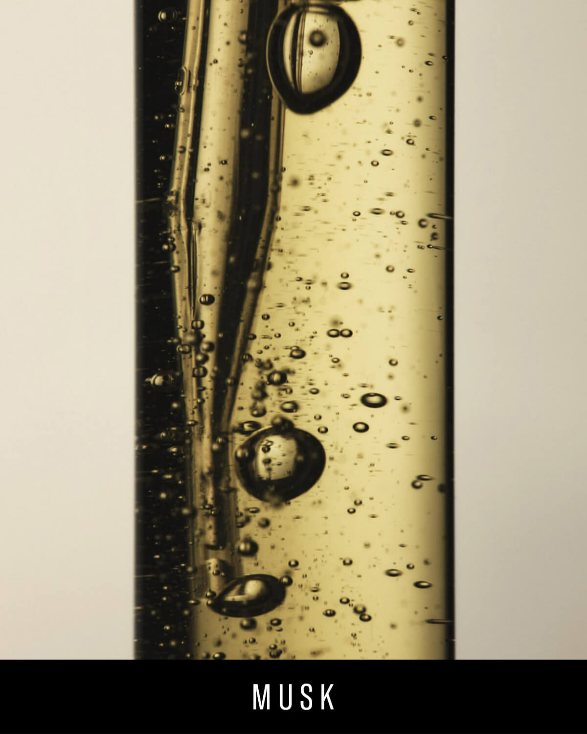 A closeup of the Fenty Eau de Parfum liquid comprising of bubbles in various sizes.