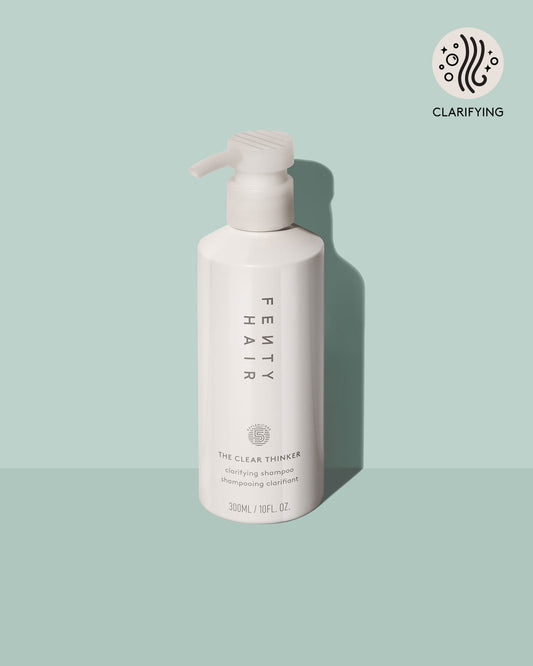 clear thinker clarifying shampoo on a light blue background