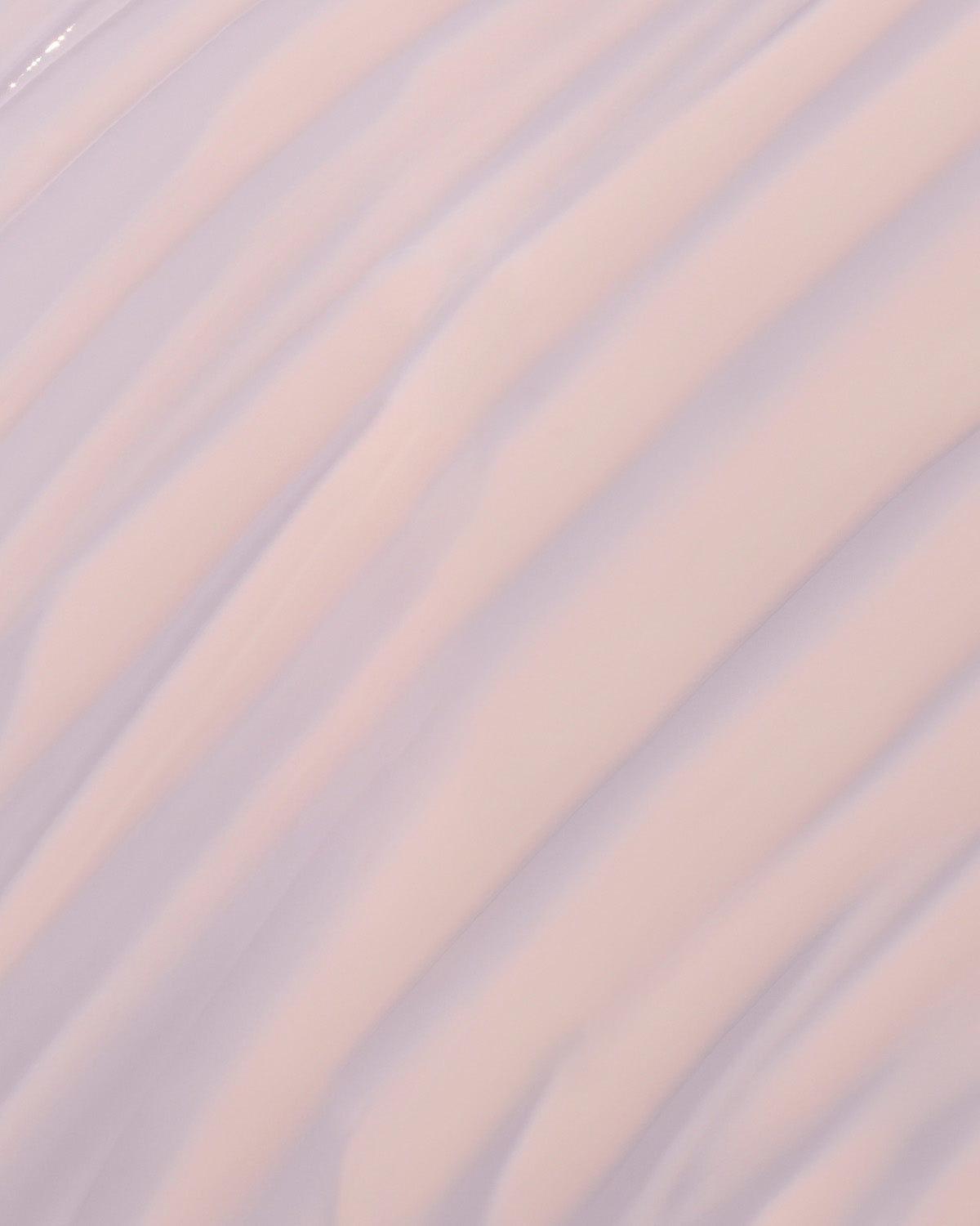 fat water milky smear on a lilac background