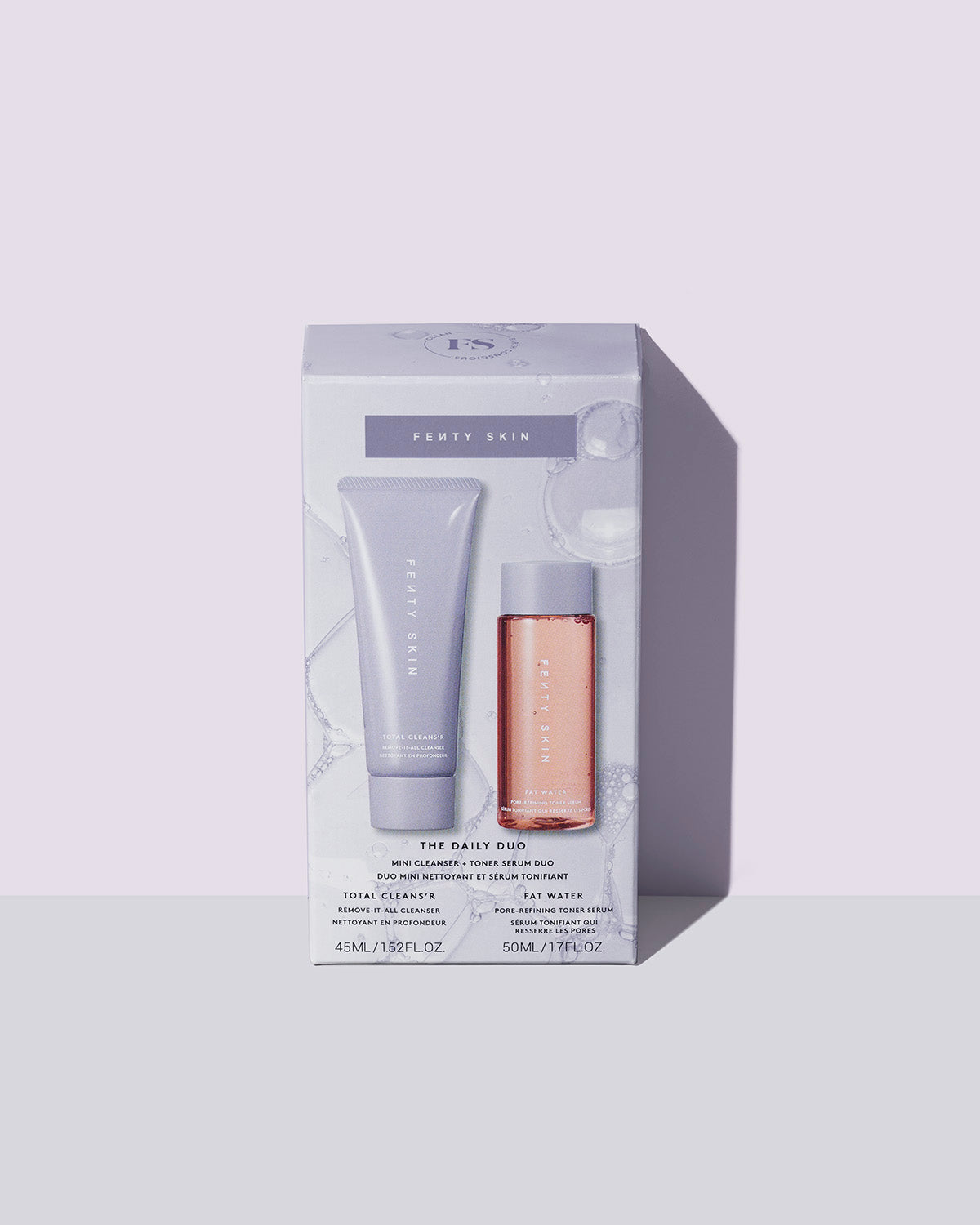 outer packaging for Fenty Skin The Daily Duo Mini Cleanser + Fat Water Toner Serum Duo on lavender background